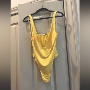 Yellow body suit
